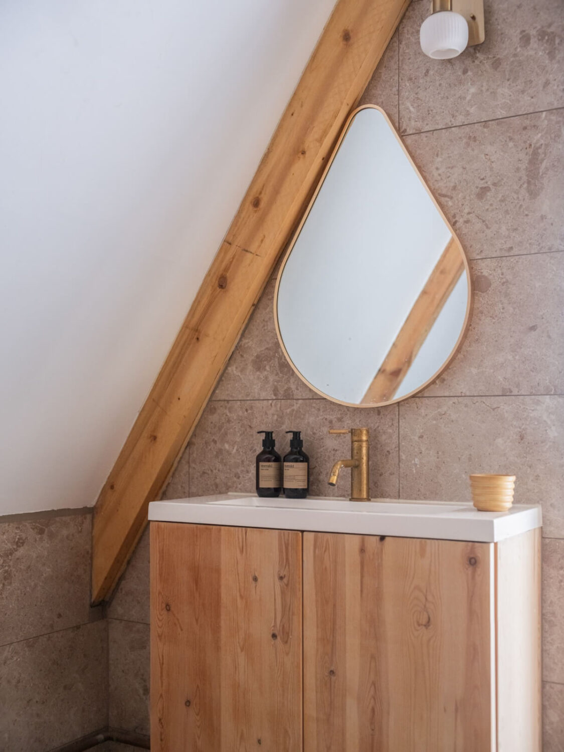 Painted Floorboards in a Unique Family Home in Sweden 29 bathroom with wooden vanity