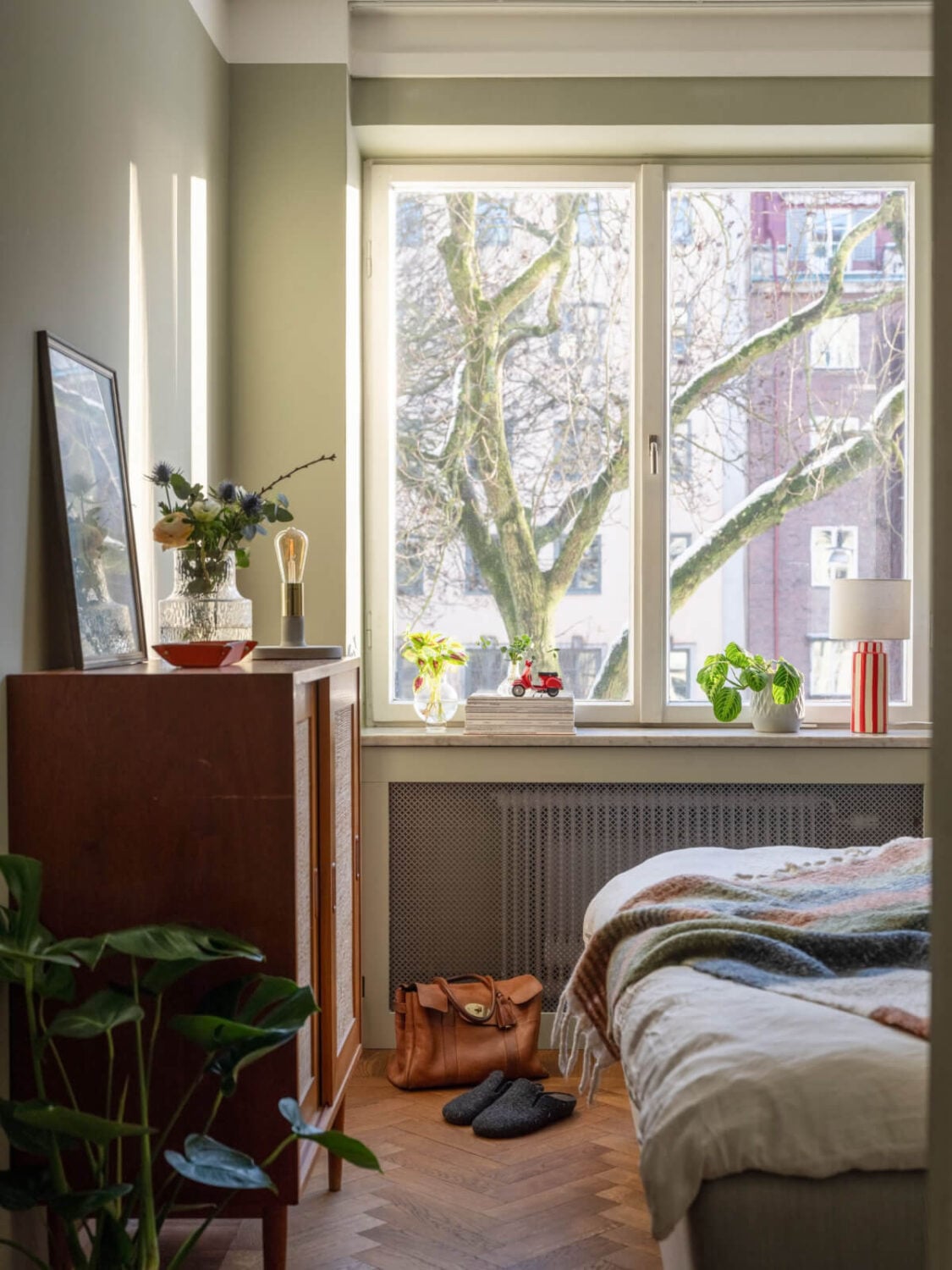 A Light, Renovated Two-Bedroom Apartment in Stockholm 14 bedroom dark parquet floor