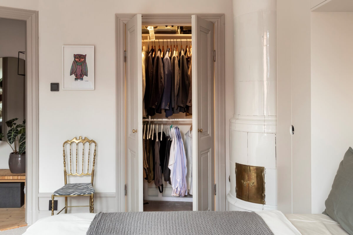A Stylish Two-Bedroom Apartment in Stockholm 19 bedroom fireplace and built in closet