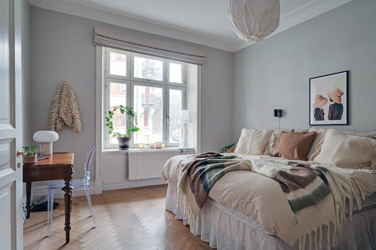 A Swedish Apartment with an Open Living Space and Period Features 21 bedroom herringbone parquet floor desk