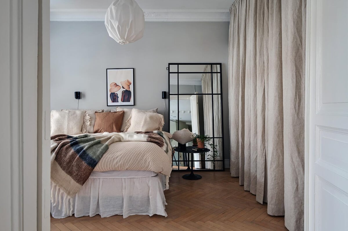 A Swedish Apartment with an Open Living Space and Period Features 23 bedroom large mirror