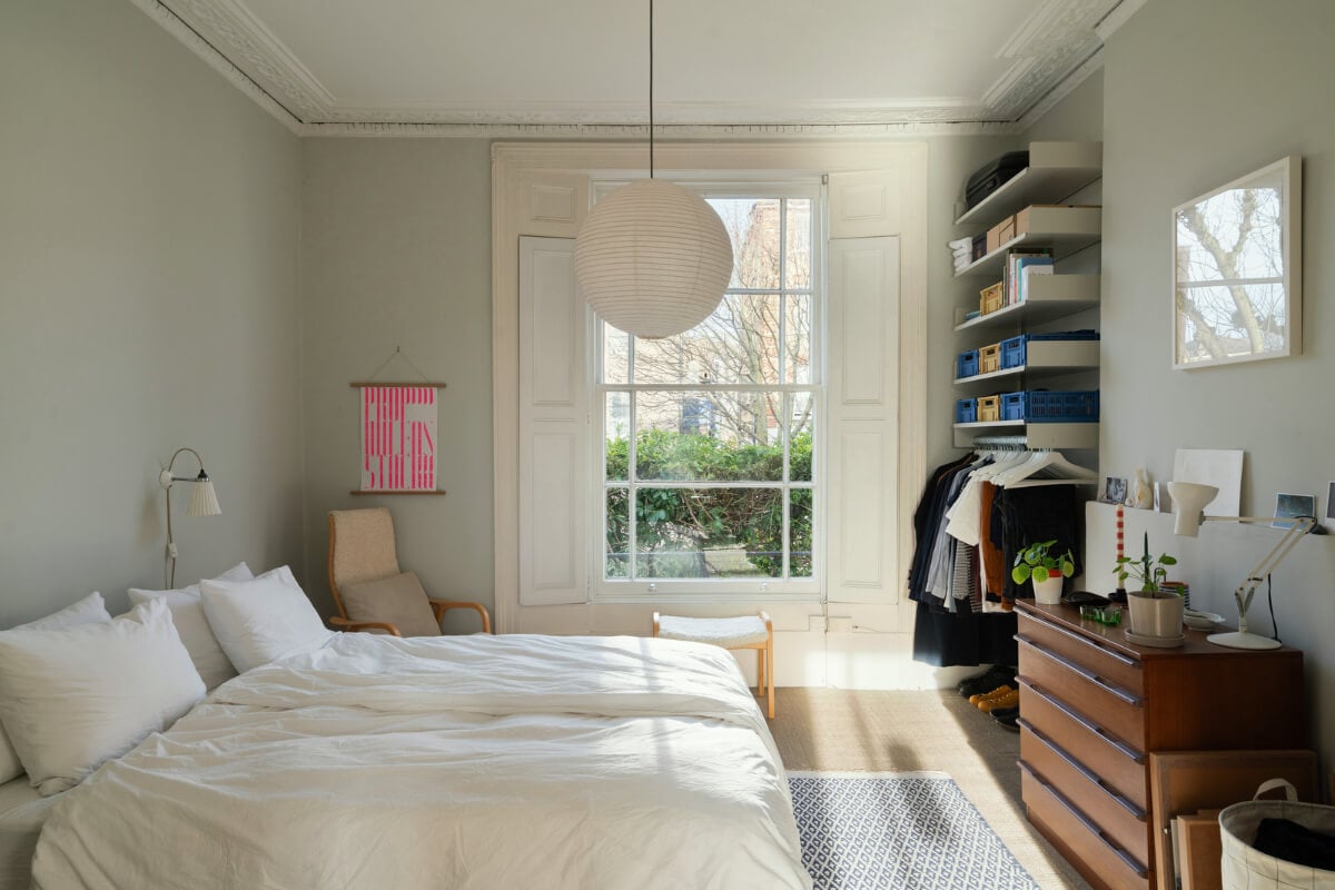 A Light One-Bedroom Apartment in a Victorian Terrace House 13 bedroom light gray walls open wardrobe