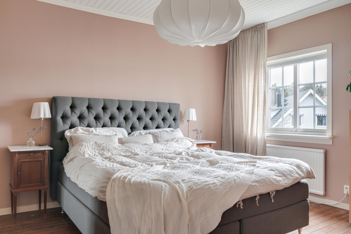 A Charming Home with Lake Views South of Stockholm 17 bedroom light pink walls