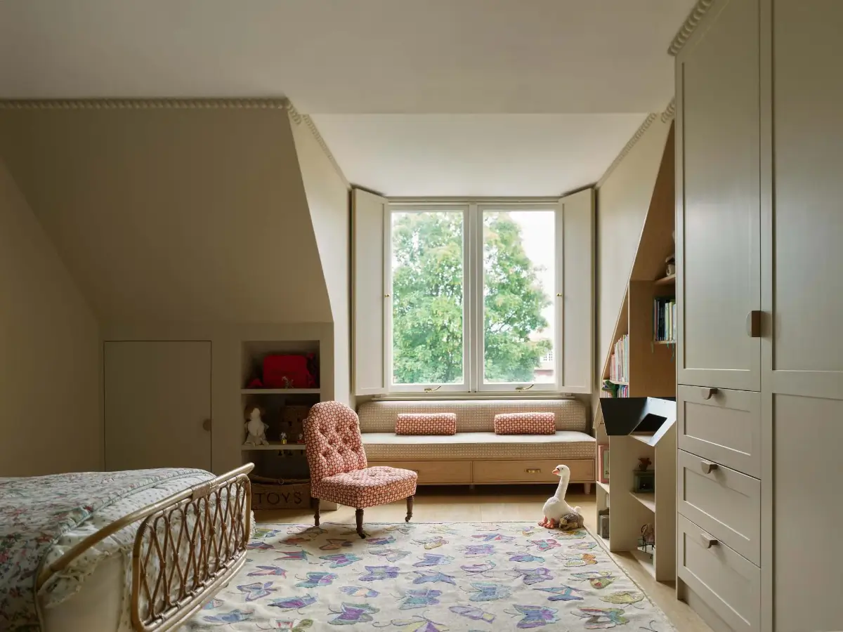 A Timeless Energy-Efficient Victorian Townhouse in Bedford Park 20 bedroom slanted ceiling window seat butterfly rug