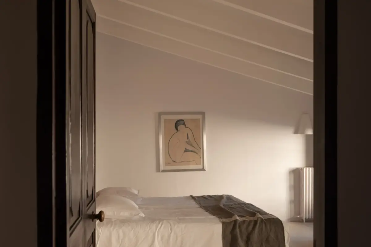 Old-World Craftsmanship and Contemporary Elegance in a Mallorcan Townhouse 9 bedroom slanted ceiling