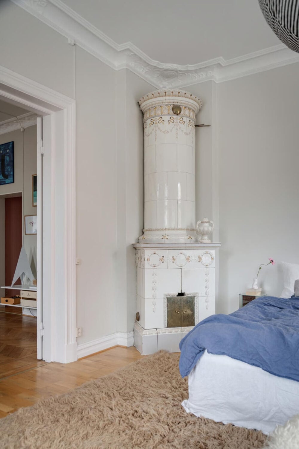 Large Rooms in an Art Nouveau Apartment in Sweden 19 bedroom tiled fireplace