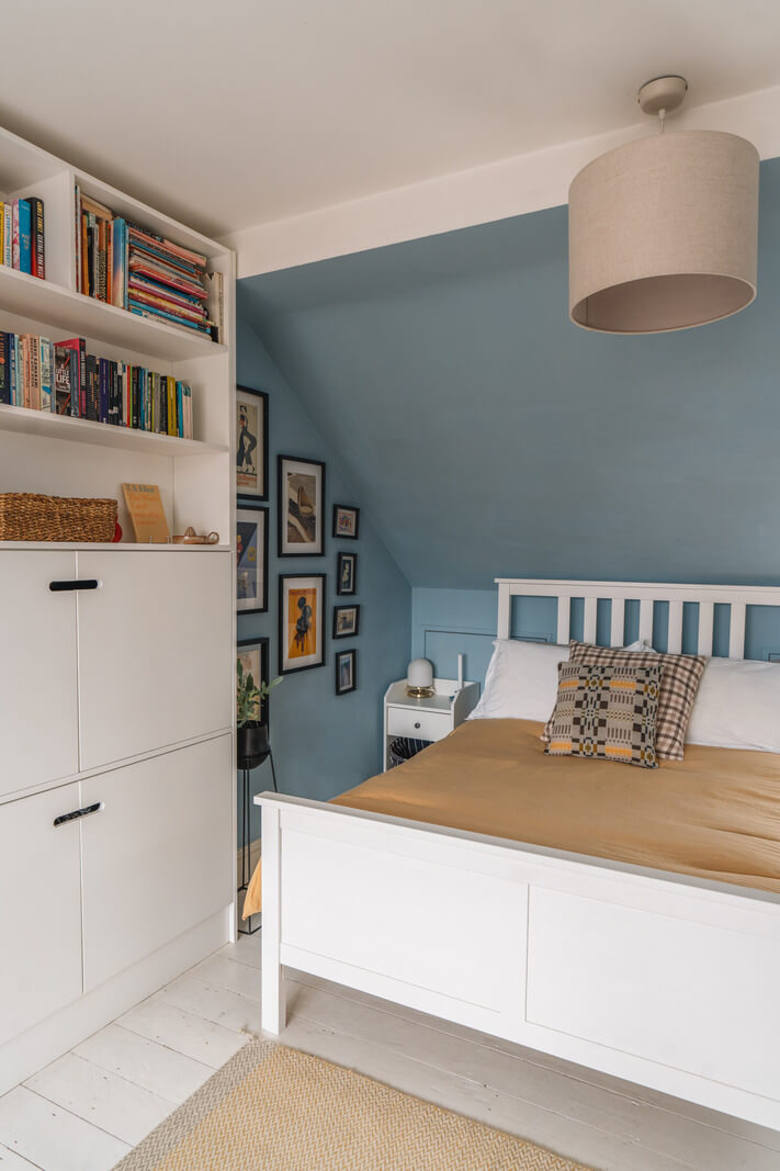 A Charming Light Edwardian House with a Tiny Garden 15 bedroom white floorboards slanted ceiling blue wall