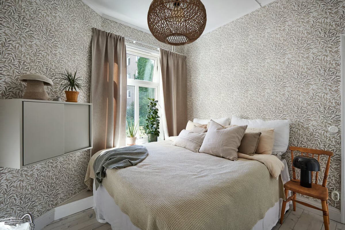 A Bright Turn-of-the-Century Apartment in Sweden 11 bedroom william morris wallpaper