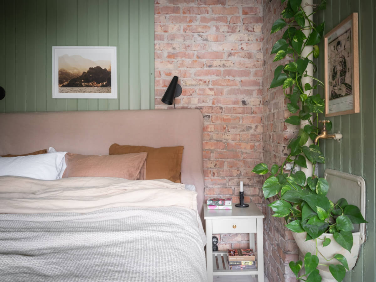 A Carefully Renovated Family Home in Sweden 29 bedroom with exposed brick wall