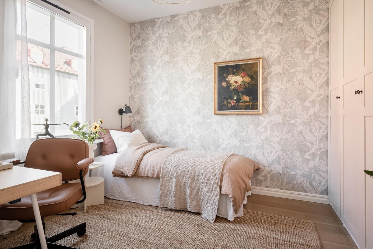 Bright Rooms with Light Color Tones in a Swedish Apartment 22 bedroom with wallpaper large rug desk and wardrobes