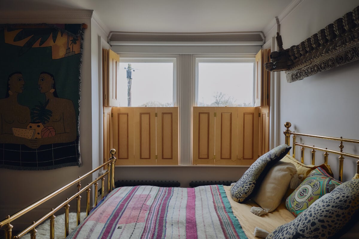 A London Edwardian House with a Light-Filled Kitchen Extension 18 bedroom with wooden shutters