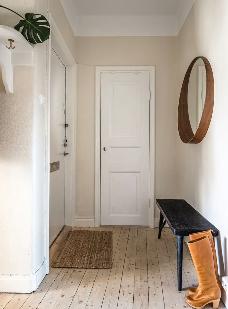 A Beige Studio Apartment with a Bright Kitchen 13 beige hallway wooden floor