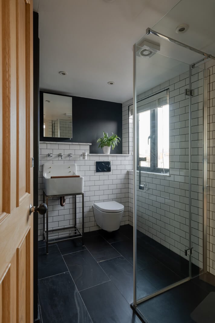 A Restored Victorian House with Exposed Brick and a Kitchen Extension 17 black and white bathroom subway tiles