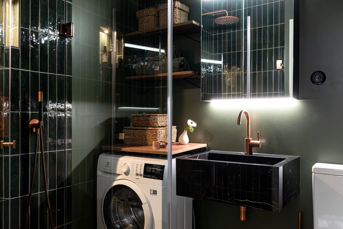 An Elegant Stockholm Apartment with a Pink and Black Kitchen 23 black bathroom