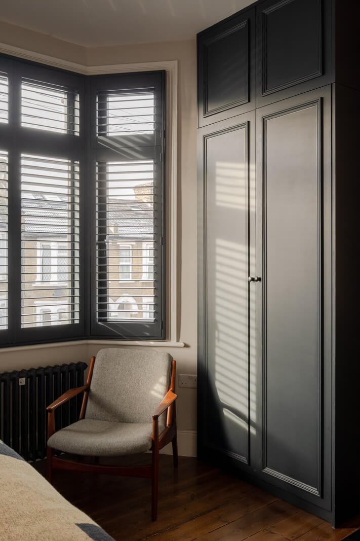 A Restored Victorian House with Exposed Brick and a Kitchen Extension 16 black built-in wardrobes