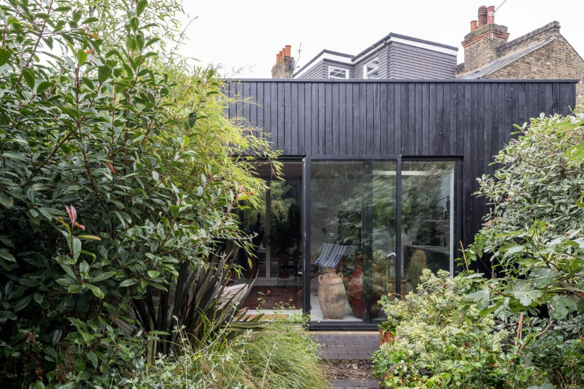 A Unique House in London with Plant-Filled Interiors and a Lush Garden 26 black cladded extension