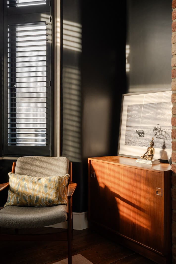 A Restored Victorian House with Exposed Brick and a Kitchen Extension 4 black living room detail