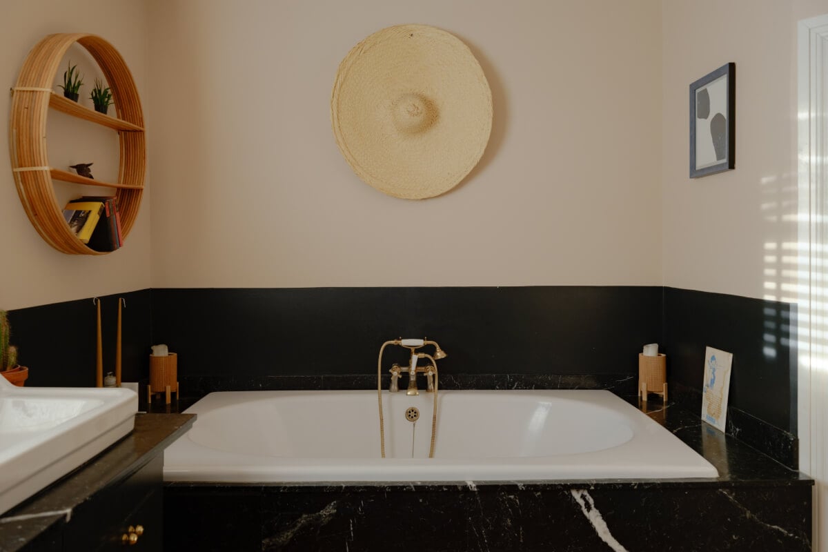 A London Edwardian House with a Light-Filled Kitchen Extension 25 black marble bathroom with bath