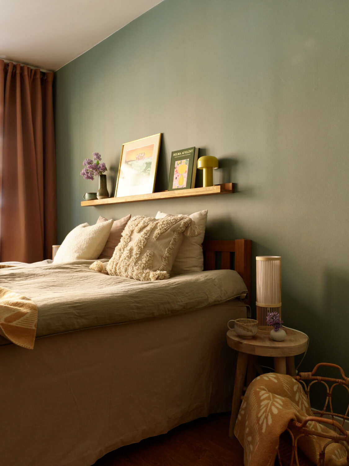 A Stockholm Apartment with a Beautifully Renovated Kitchen 16 blue bedroom shelf above bed