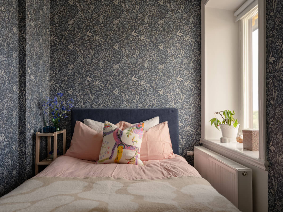 A Small Apartment with High Ceilings and a Large Bay Window 13 blue floral wallpaper tiny bedroom A Small Apartment with High Ceilings and a Large Bay Window