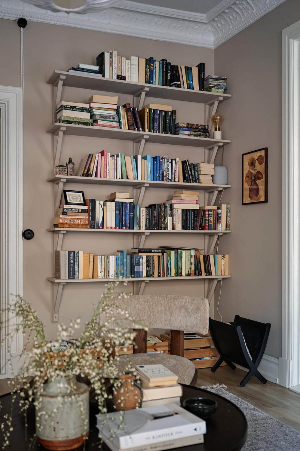 Warm and Inviting Rooms in a Renovated Swedish Apartment 9 bookshelves