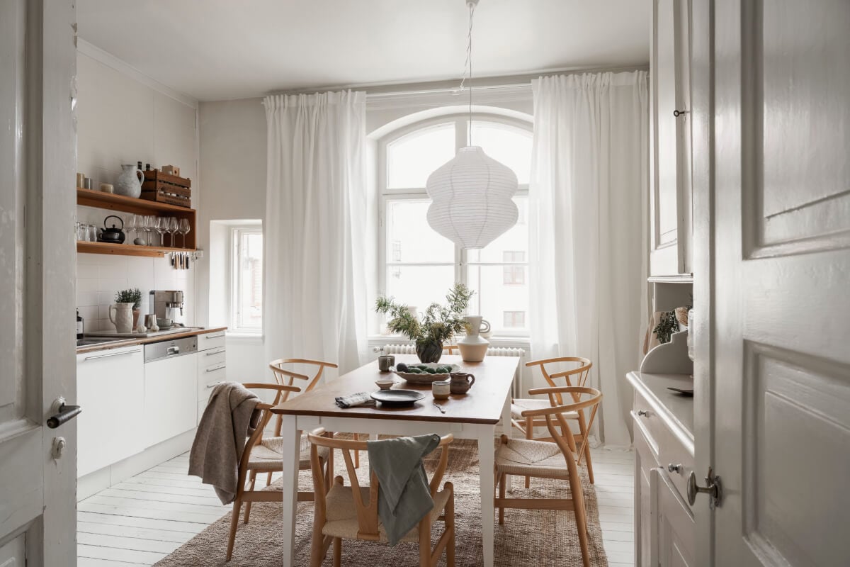 A Stylish Studio Apartment with Period Features and Large Windows 13 bright kitchen white floorboards