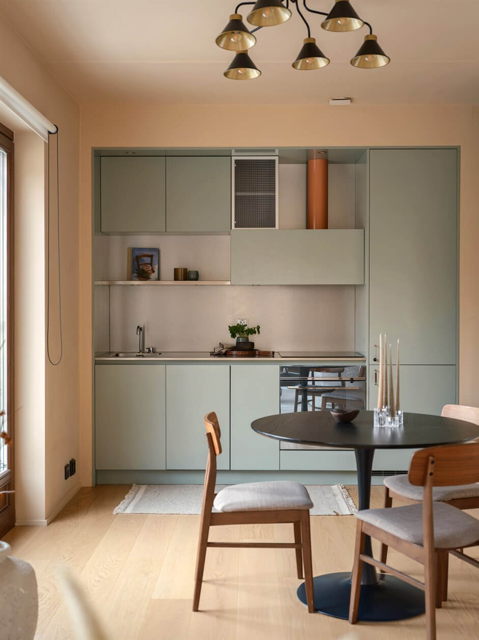 A Small Modern Stockholm Apartment with Smart Storage Solutions 12 built in kitchen