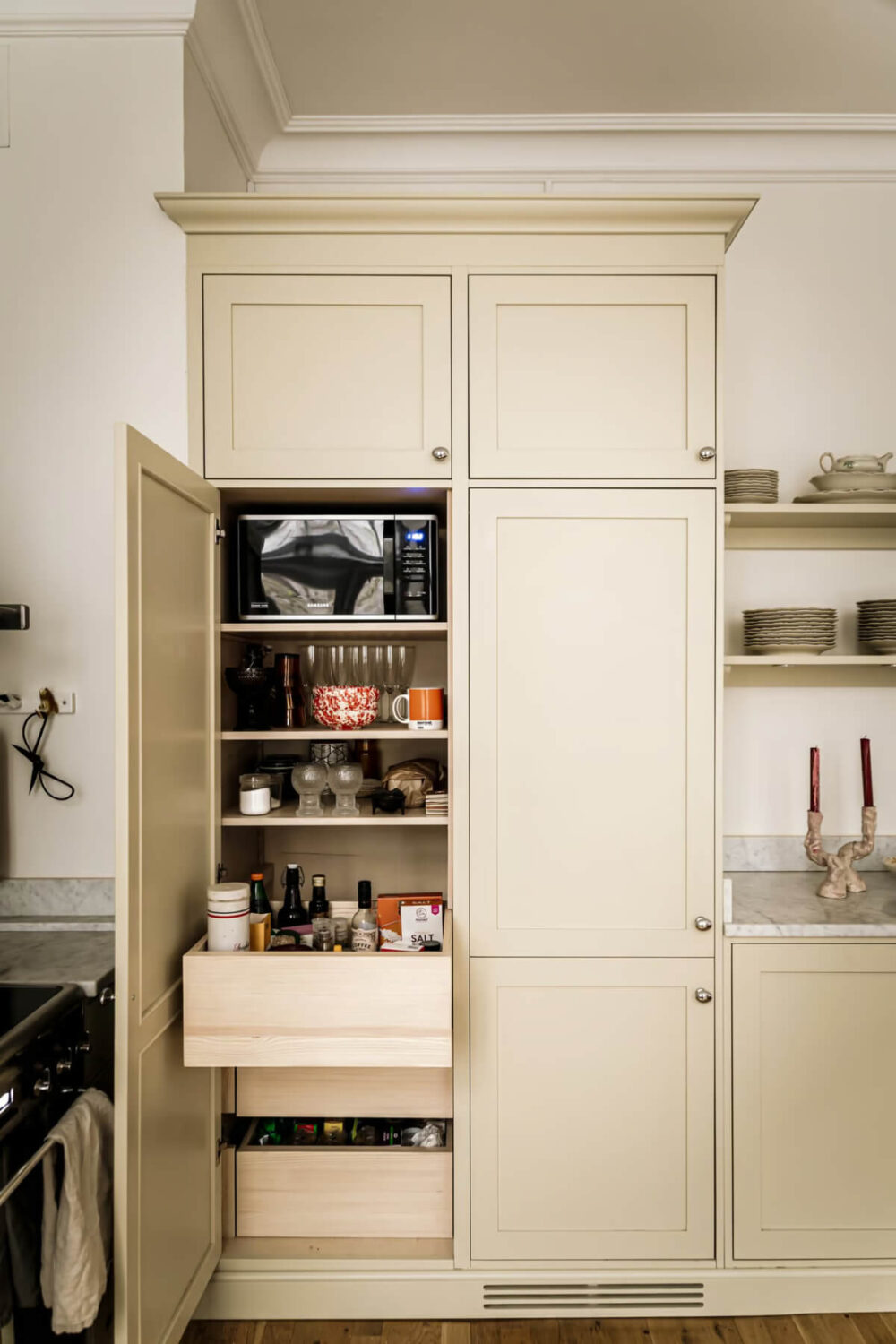 Large Rooms in an Art Nouveau Apartment in Sweden 10 butter yellow kitchen cabinets