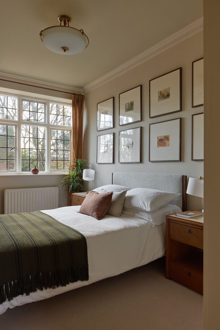 A Stunning Victorian House with Period Features and Surprising Spaces 22 calm bedroom gallery wall