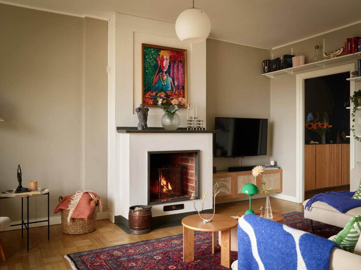 A Charming Two-Bedroom Corner Apartment in a 1940s Building 1 calm living room fireplace shelf above door