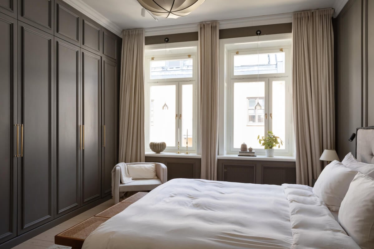 A Calm, Neutral Color Palette in a Classic Swedish Apartment 18 calm master bedroom wardrobe wall