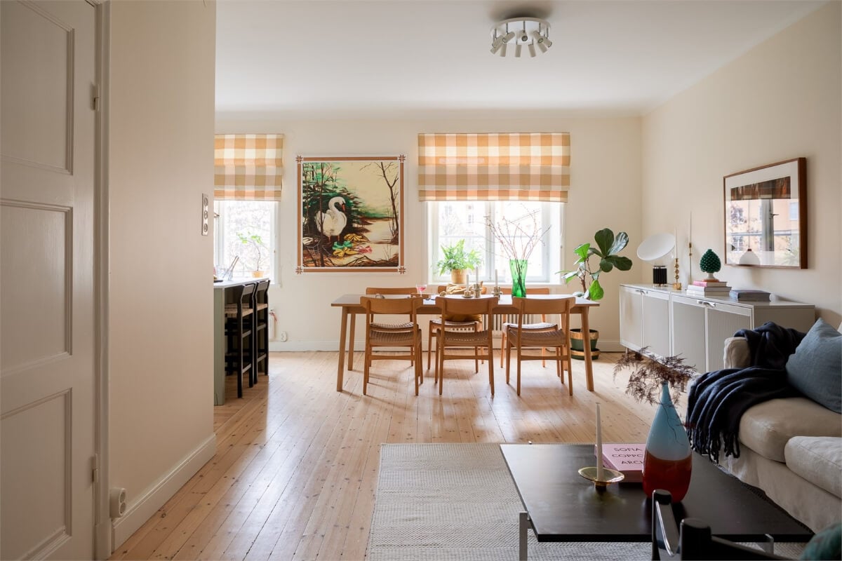 A Light-Filled Two Bedroom Apartment in Stockholm 2 checkerboard blinds open plan living space