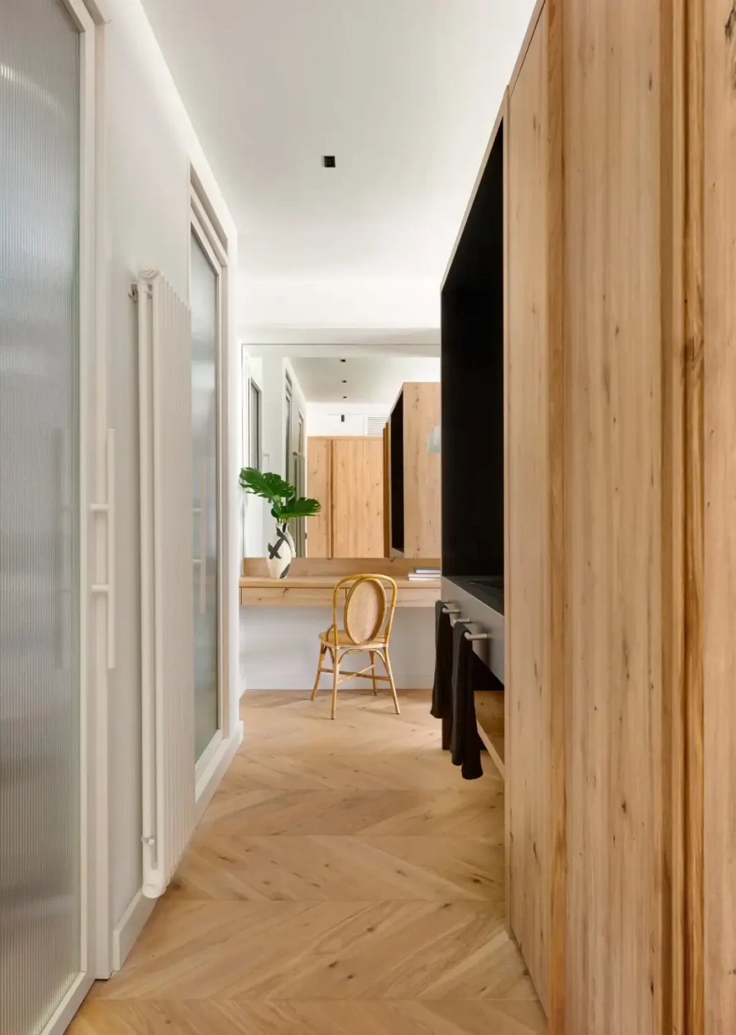 A Modern Barcelona Apartment with a Pink Bathroom 15 chevron floor vanity table