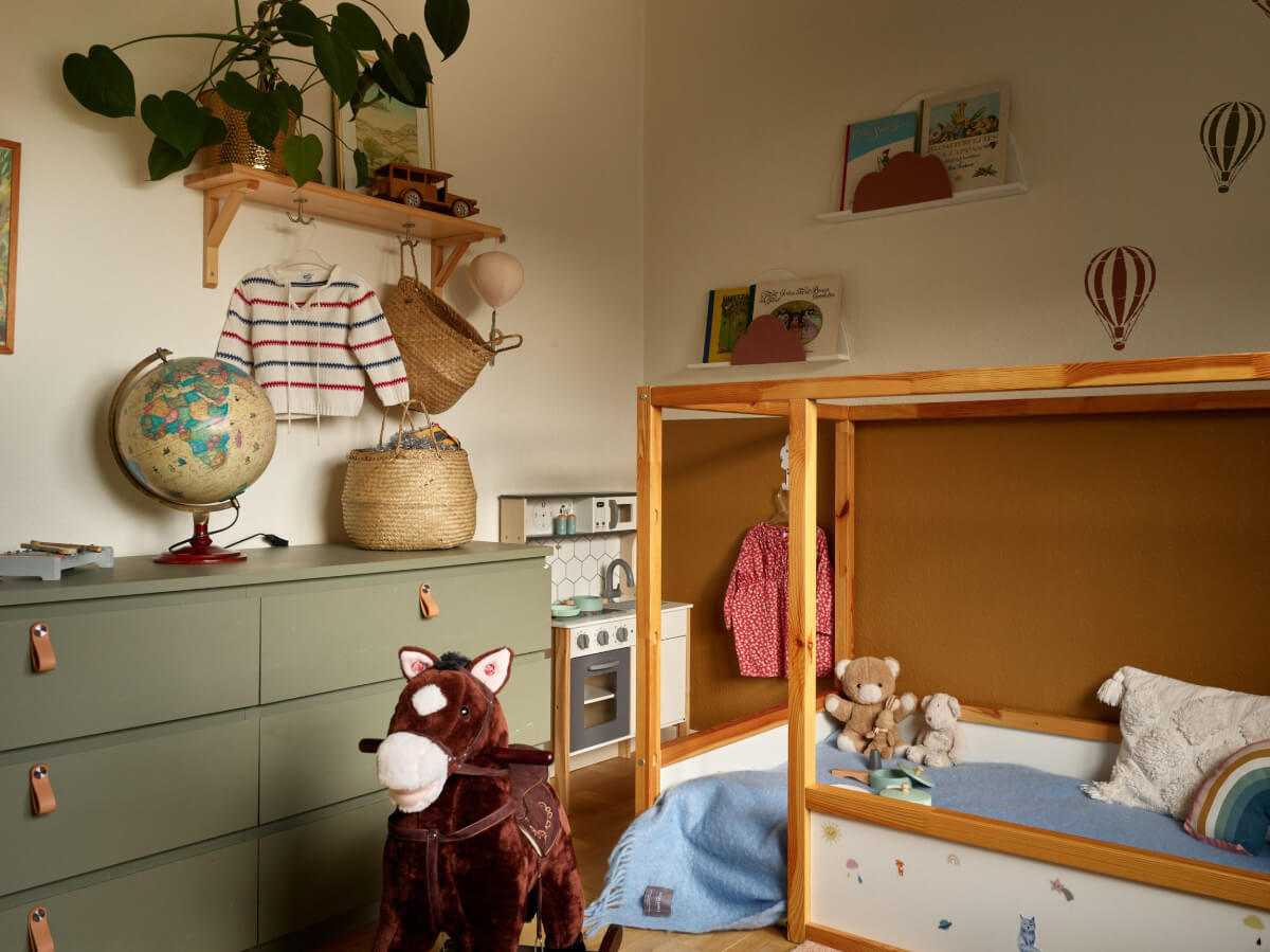 A Charming Two-Bedroom Corner Apartment in a 1940s Building 20 childrens bedroom green drawers