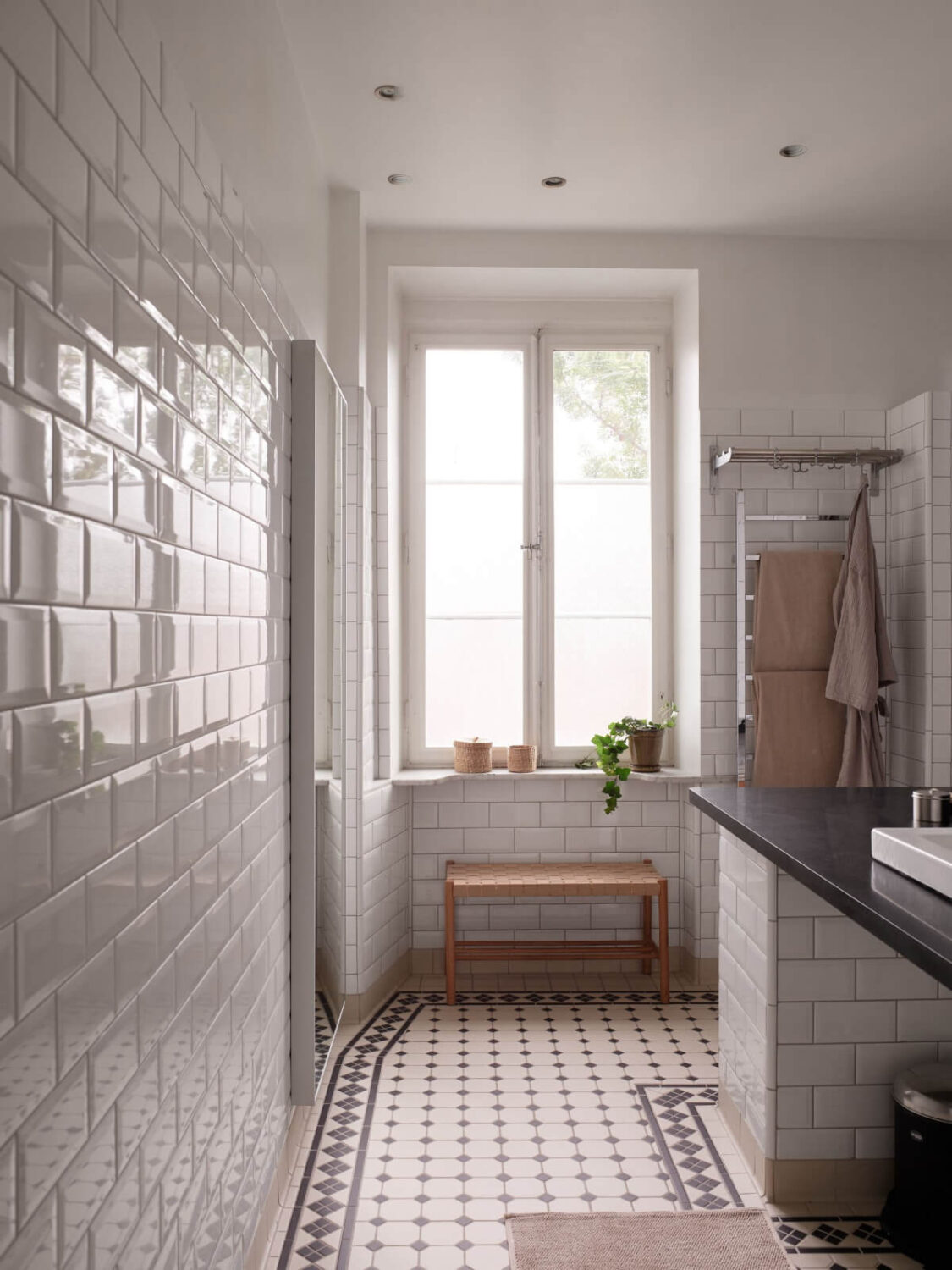 A Grand Early 20th-Century Apartment in Stockholm 27 classic bathroom black and white tiles