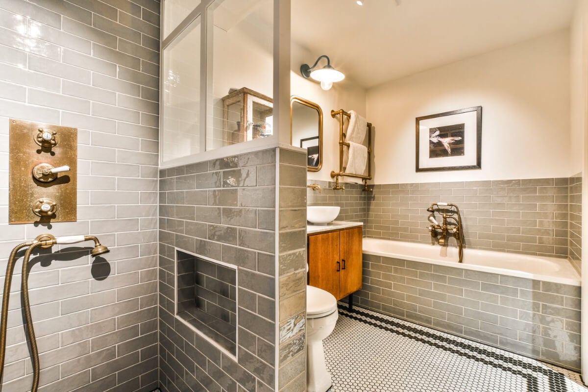 A Unique Ground Floor Duplex Apartment in Amsterdam 17 classic bathroom subway tiles brass fittings