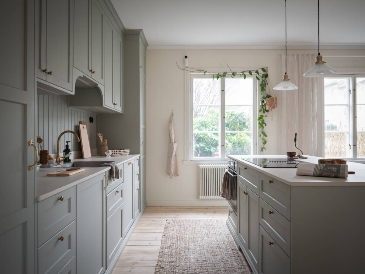 A Carefully Renovated Family Home in Sweden 7 classic kitchen in muted tones