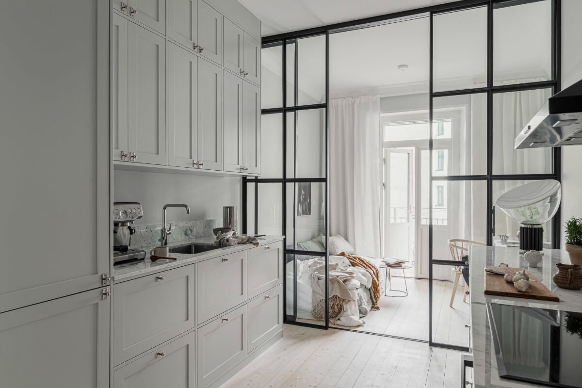 Period Features and Contemporary Solutions in Gothenburg 18 classic light gray kitchen steel framed glass doors