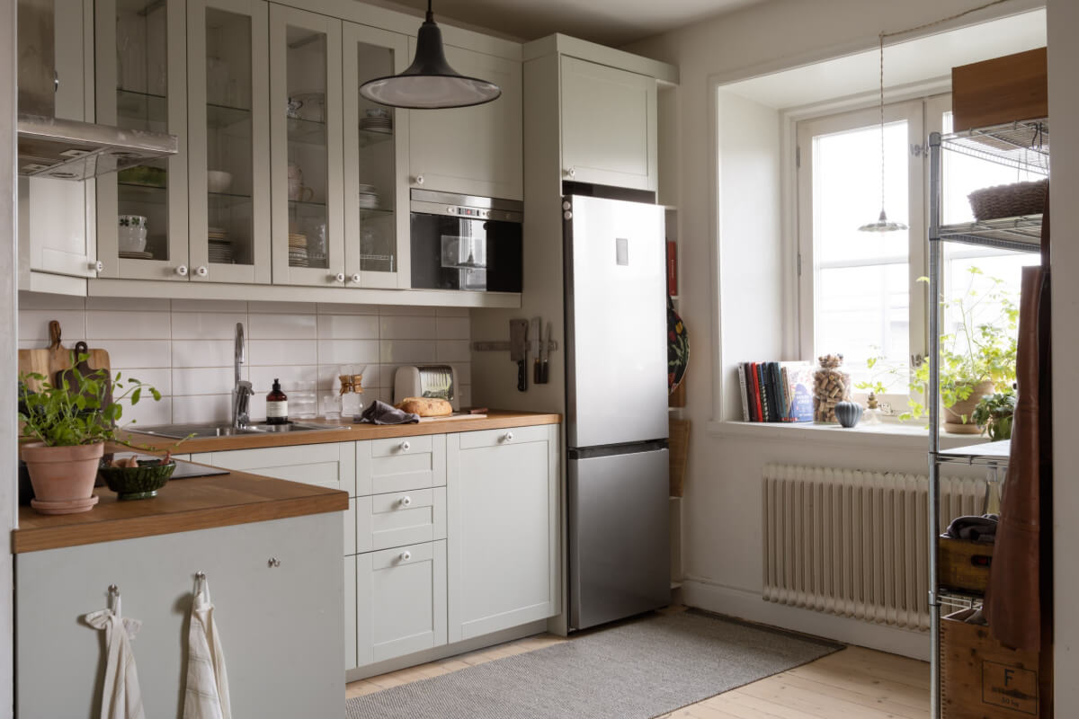 A Swedish Maisonette Apartment with Basement Bedrooms 6 classic light gray kitchen
