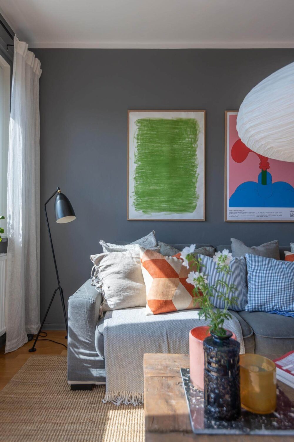 Light Rooms and a Moody Color Palette in a 1930s Apartment 5 colorful decor living room