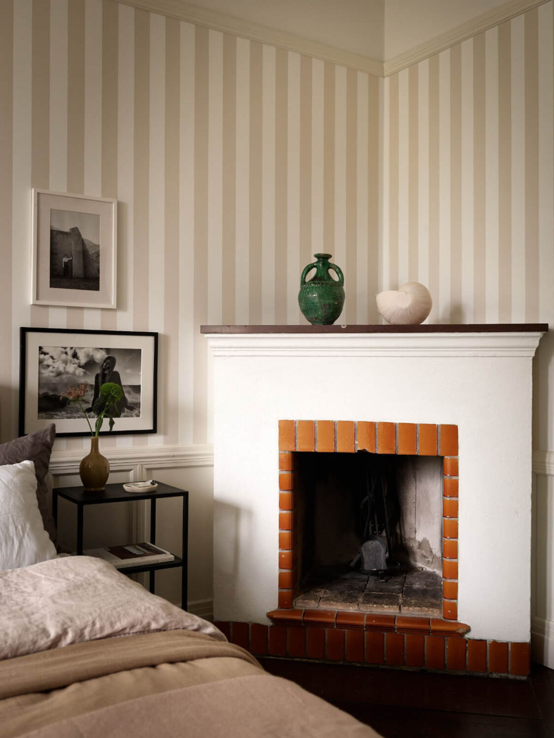 A Grand Early 20th-Century Apartment in Stockholm 23 corner fireplace bedroom