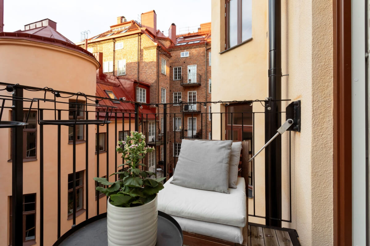 A Stylish Two-Bedroom Apartment in Stockholm 18 courtyard balcony swedish architecture