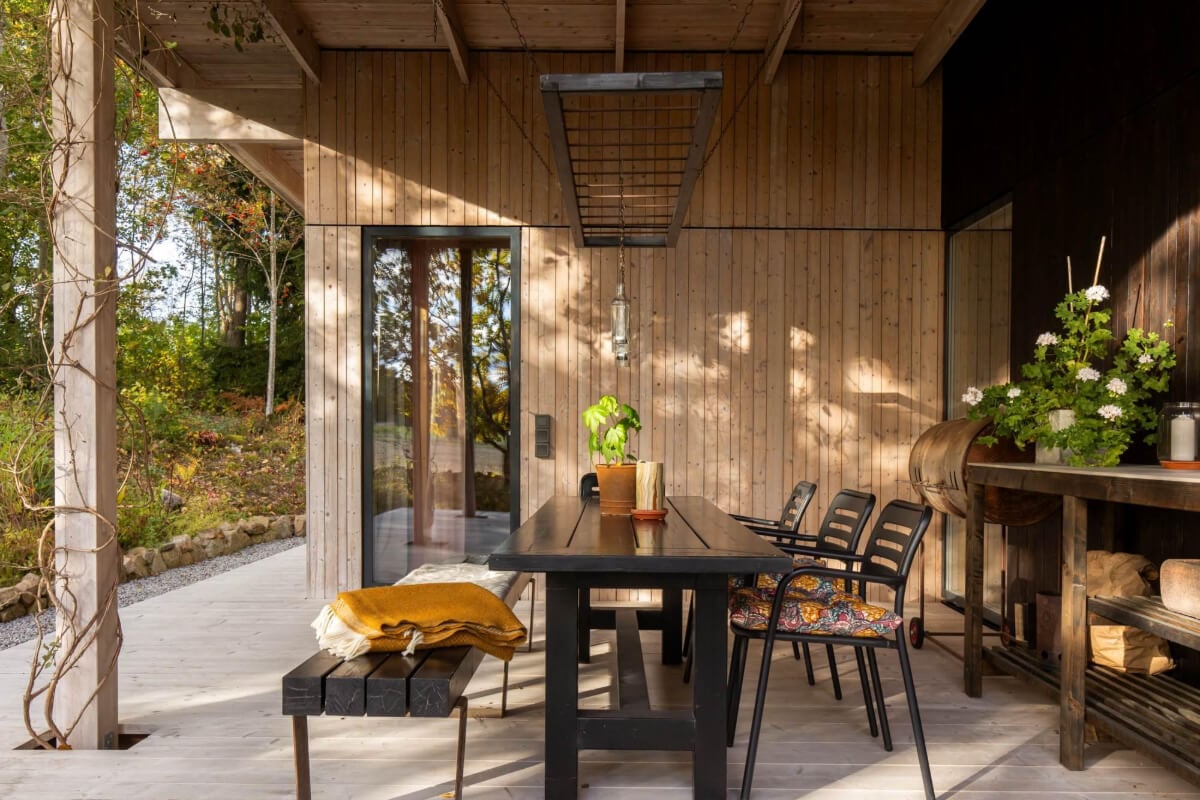 A Swedish Architectural Villa Surrounded by Nature 22 covered outdoor terrace