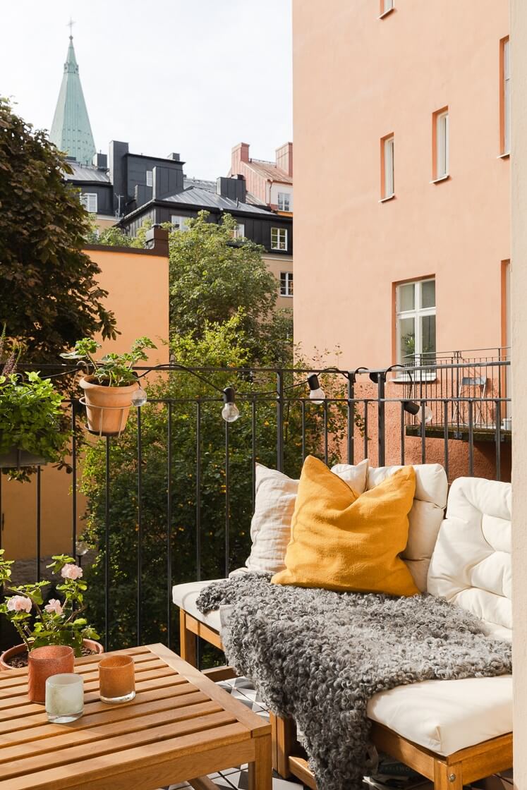 Modern Interiors in a Bright 1930s Apartment in Sweden 12 cozy balcony seating