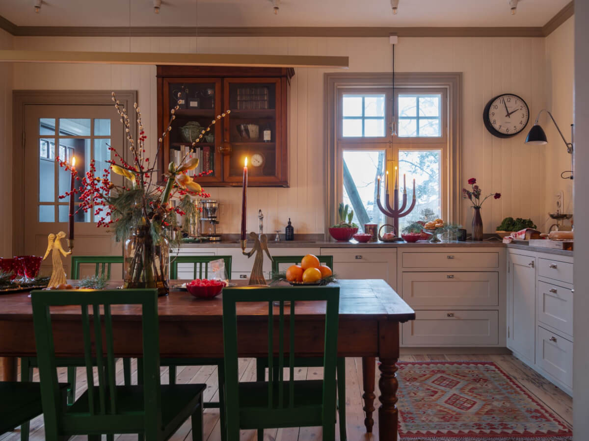 A Beautiful Turn-of-the-Century Family Home in Sweden 17 cozy kitchen rustic wooden table wooden walls