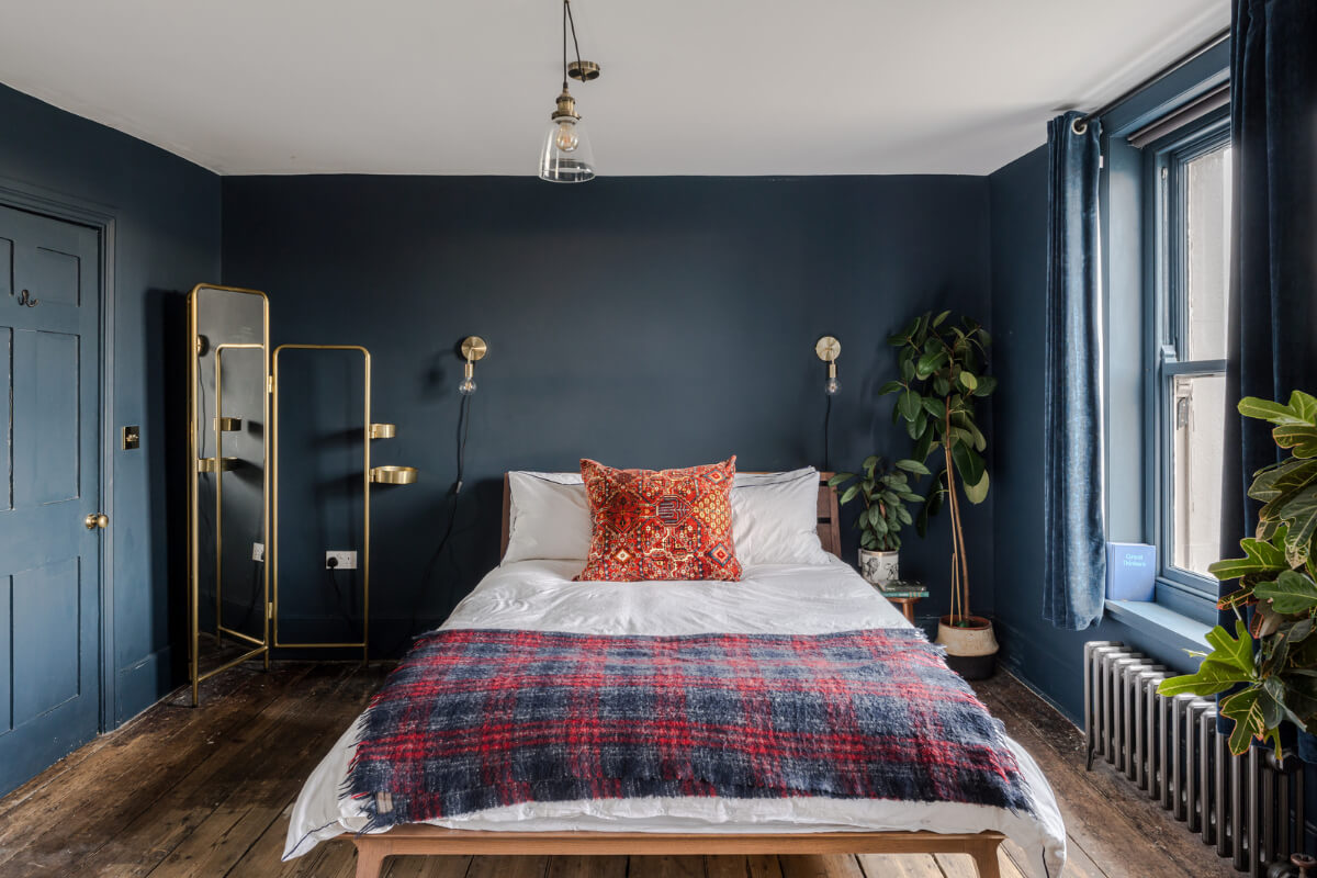 Timeworn Original Floorboards in a Regency Seaside Home 14 dark blue bedroom raw wooden floorboards