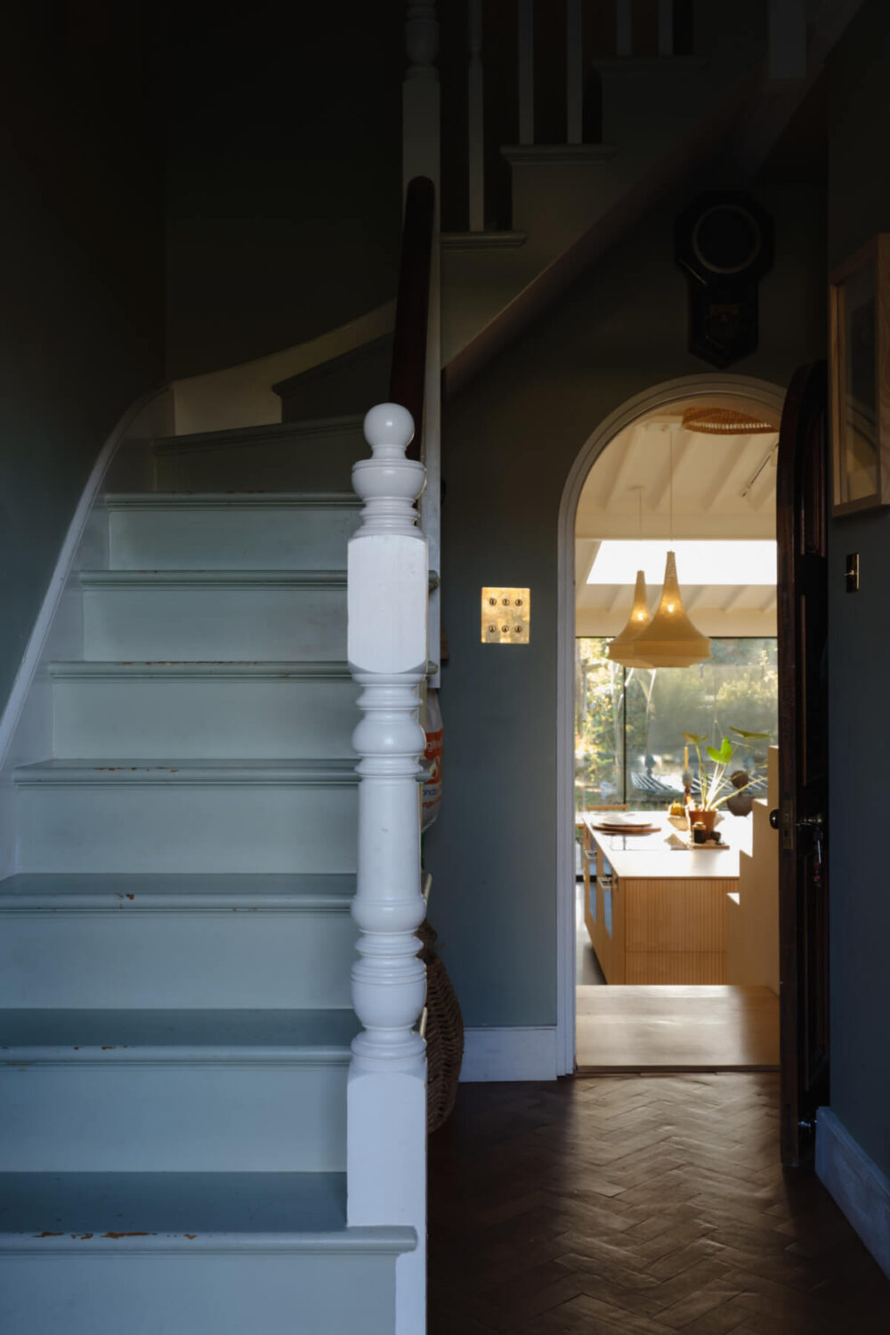 A London Edwardian House with a Light-Filled Kitchen Extension 14 dark blue hall with staircase