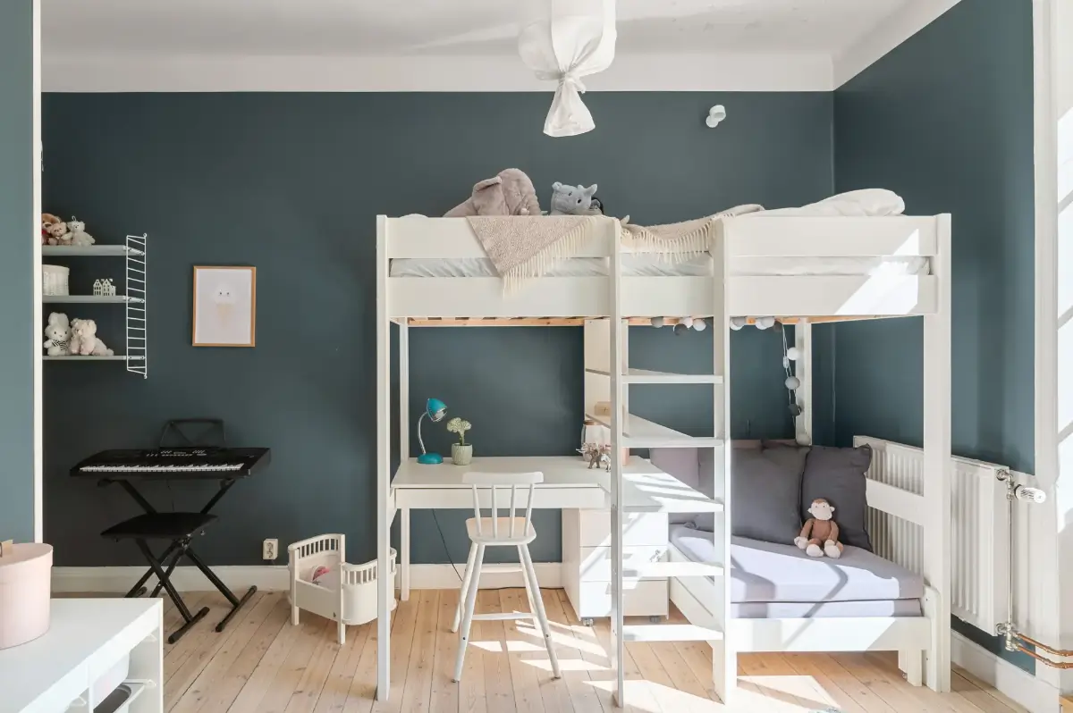 A Charming Ground Floor Family Apartment in Stockholm 11 dark blue kids bedroom