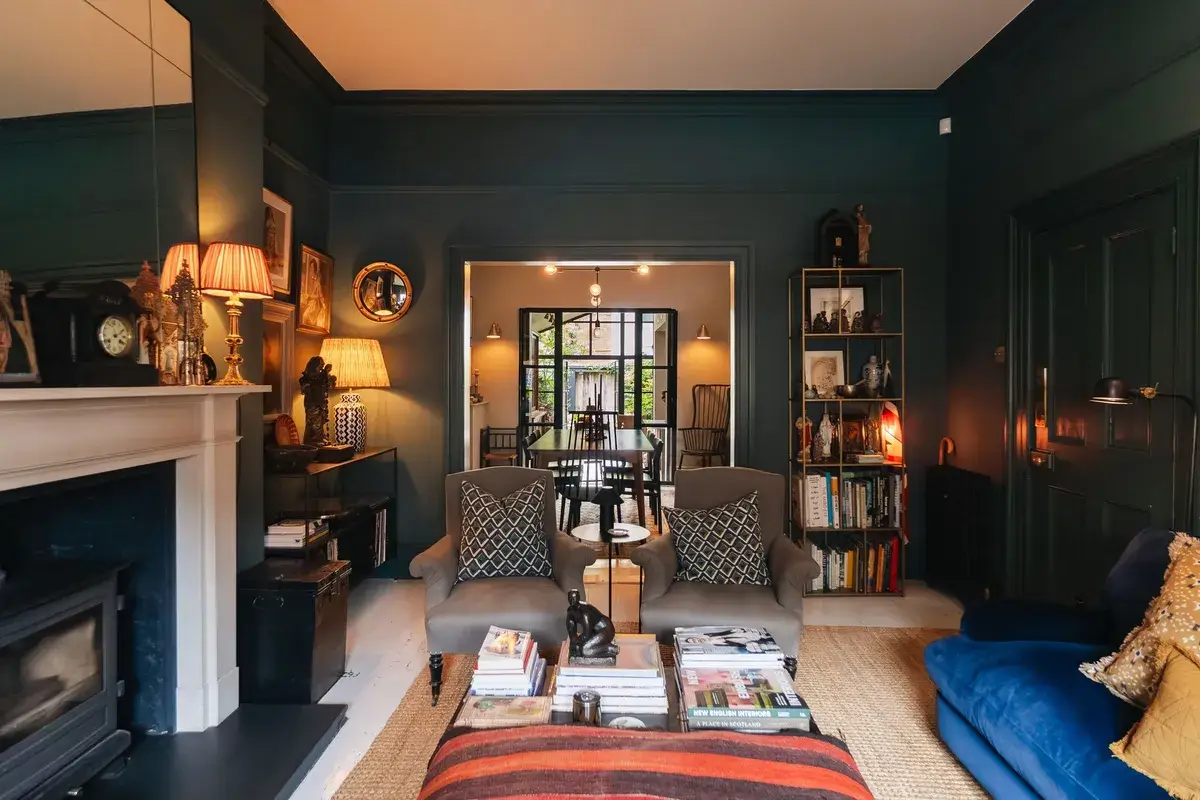A Renovated Georgian Townhouse with a Stunning Kitchen Extension 5 dark blue living room double reception space A Renovated Georgian Townhouse with a Stunning Kitchen Extension