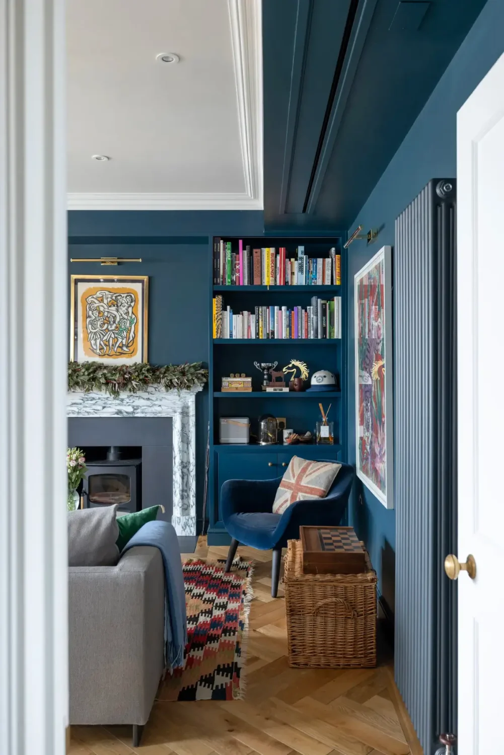 A Beautiful Duplex Apartment in a Notting Hill Townhouse 6 dark blue sitting room herringbone floor